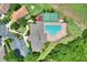 Aerial view of clubhouse with pool, basketball court, playground, and parking at 1233 Emerald Hill Way, Valrico, FL 33594