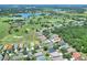 Aerial view of a residential community near a golf course, showcasing the home's location and neighborhood at 1233 Emerald Hill Way, Valrico, FL 33594