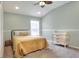 Bedroom with light walls, carpet flooring, white trim and an airy feel at 1233 Emerald Hill Way, Valrico, FL 33594