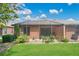 Expansive backyard featuring a screened-in lanai, lush greenery, and mature trees, offering a private outdoor oasis at 163 Shell Falls Dr, Apollo Beach, FL 33572