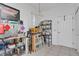 Pantry with white walls, overhead lighting, and lots of shelving for storage at 163 Shell Falls Dr, Apollo Beach, FL 33572