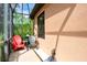 Screened lanai featuring two chairs and beautiful greenery providing a private outdoor living space at 163 Shell Falls Dr, Apollo Beach, FL 33572