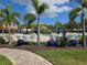 Relaxing pool area features comfortable seating, landscaping, and lounging at 163 Shell Falls Dr, Apollo Beach, FL 33572