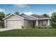 Charming single-story home with a two-car garage, well-manicured lawn, and beautiful landscaping at 6021 Mangrove Creek Rd, Wimauma, FL 33598