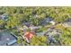 Birds-eye view of the property with a pool and lush green backyard at 607 N Merrin St, Plant City, FL 33563