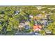 Overhead view of a property highlighting the pool and lush landscaping at 607 N Merrin St, Plant City, FL 33563