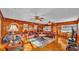 Cozy living room with natural lighting, ceiling fans, and comfortable seating at 607 N Merrin St, Plant City, FL 33563