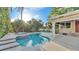 Inviting backyard pool and patio area, perfect for outdoor entertaining and relaxation at 607 N Merrin St, Plant City, FL 33563