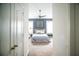 Bedroom showcasing a comfortable bed, neutral colors, and natural light at 11567 Misty Isle Ln, Riverview, FL 33579