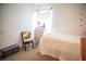 Bedroom with white walls, hearts decals, vintage dresser and decor at 11567 Misty Isle Ln, Riverview, FL 33579