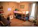 Fun bedroom with bunk beds, dinosaur decor and gaming neon sign at 11567 Misty Isle Ln, Riverview, FL 33579