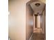 Hallway with tile flooring leading to bedrooms at 11567 Misty Isle Ln, Riverview, FL 33579