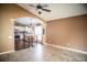 Open floorplan with living area and connected view into kitchen at 11567 Misty Isle Ln, Riverview, FL 33579
