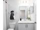 Modern bathroom with a sleek vanity, toilet, and shower with neutral tones and a stylish towel rack at 2764 Walden Town Cir, Plant City, FL 33566