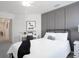 Comfortable bedroom features a queen bed, decor, and an open doorway at 2764 Walden Town Cir, Plant City, FL 33566