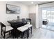 Contemporary dining area featuring a bar-height table with seating for four and modern decor at 2764 Walden Town Cir, Plant City, FL 33566