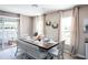 Bright dining area featuring ample seating and sliding door access to the exterior at 2770 Walden Town Cir, Plant City, FL 33566