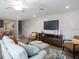 Cozy living room showcases ample seating, a ceiling fan, and abundant natural light at 2770 Walden Town Cir, Plant City, FL 33566