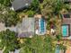 Aerial view of the property showcasing the pool, patio, yard, and roof at 2872 Hammock Dr, Plant City, FL 33566