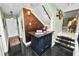 Home bar area featuring a metallic backsplash, bar top, and decorative lighting at 2872 Hammock Dr, Plant City, FL 33566