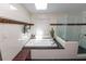 Bright bathroom featuring a jacuzzi tub, shower, and tiled walls at 2872 Hammock Dr, Plant City, FL 33566
