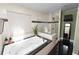 Bright bathroom featuring a jacuzzi tub, shower, and tiled walls at 2872 Hammock Dr, Plant City, FL 33566