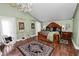 Luxurious main bedroom featuring detailed trim, a decorative area rug, and ample natural light at 2872 Hammock Dr, Plant City, FL 33566