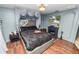 Intriguing bedroom with fireplace, television, and ornate ceiling detail at 2872 Hammock Dr, Plant City, FL 33566