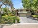 Charming two-story home with a spacious three-car garage and a well-maintained lawn at 2872 Hammock Dr, Plant City, FL 33566