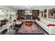 Bright living area boasts a fireplace, comfortable seating, and elegant design at 2872 Hammock Dr, Plant City, FL 33566