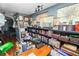 Office with antique desk, bookshelf, and interesting art at 2872 Hammock Dr, Plant City, FL 33566