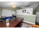 Functional office space with ample desk area, built-in shelving and soft lighting, perfect for productivity at 2872 Hammock Dr, Plant City, FL 33566