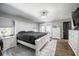 Spacious main bedroom with hardwood floors and a private door to the patio at 7608 Franklin Rd, Plant City, FL 33565