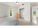 Inviting bedroom with natural light, closet, and neutral tones for a comfortable, personalized space at 1018 Briarwood Ave, Tampa, FL 33613