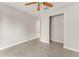 Spacious bedroom with closet and fan boasts natural light and open layout, perfect for relaxation at 1018 Briarwood Ave, Tampa, FL 33613