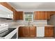 Well-lit kitchen featuring ample counter space and modern appliances at 1018 Briarwood Ave, Tampa, FL 33613
