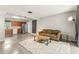 Bright and open living room with an inviting couch at 1018 Briarwood Ave, Tampa, FL 33613