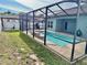 Private pool area with screened enclosure at 1201 Lavender Jewel Ct, Plant City, FL 33563