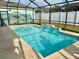 Inviting pool area featuring a water feature and ample space for lounging at 1201 Lavender Jewel Ct, Plant City, FL 33563