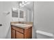 Well-maintained bathroom with single sink vanity and neutral color scheme at 2622 Lantern Hill Ave, Brandon, FL 33511
