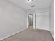 Cozy bedroom featuring neutral carpet and closet at 2622 Lantern Hill Ave, Brandon, FL 33511