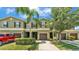 Charming townhome exterior with a well-manicured lawn, lush landscaping, and inviting curb appeal at 2622 Lantern Hill Ave, Brandon, FL 33511