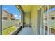 A cozy screened-in patio offers an inviting outdoor living space with comfortable seating at 2622 Lantern Hill Ave, Brandon, FL 33511