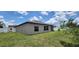 Beautiful backyard showcasing lush green grass and privacy fence at 3188 Nubbin Ridge Ln, Zephyrhills, FL 33540