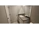 Bathroom featuring a sink, granite countertops, and white cabinetry at 3188 Nubbin Ridge Ln, Zephyrhills, FL 33540