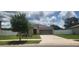 Charming single-story home with well-manicured lawn and two car garage at 3188 Nubbin Ridge Ln, Zephyrhills, FL 33540