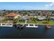 Waterfront homes feature private docks, offering stunning views and convenient access to the open water at 3626 Corsair Ct, New Port Richey, FL 34652