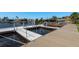 Modern dock with boat lift and convenient water access providing a relaxing and enjoyable waterfront experience at 3626 Corsair Ct, New Port Richey, FL 34652