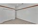 Bright bedroom with a double door closet, and light tile flooring throughout at 5370 Boxtree Ct, Dade City, FL 33523