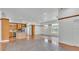 Open-concept kitchen with stainless steel appliances and a breakfast bar at 5370 Boxtree Ct, Dade City, FL 33523